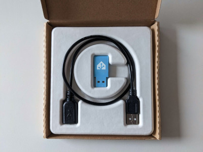 Home Assistant Connect ZBT-1 with USB extension cable in packaging